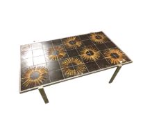 A 20th century Danish metal framed sunflower tiled top coffee table,