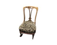 A 19th century mahogany rocking chair