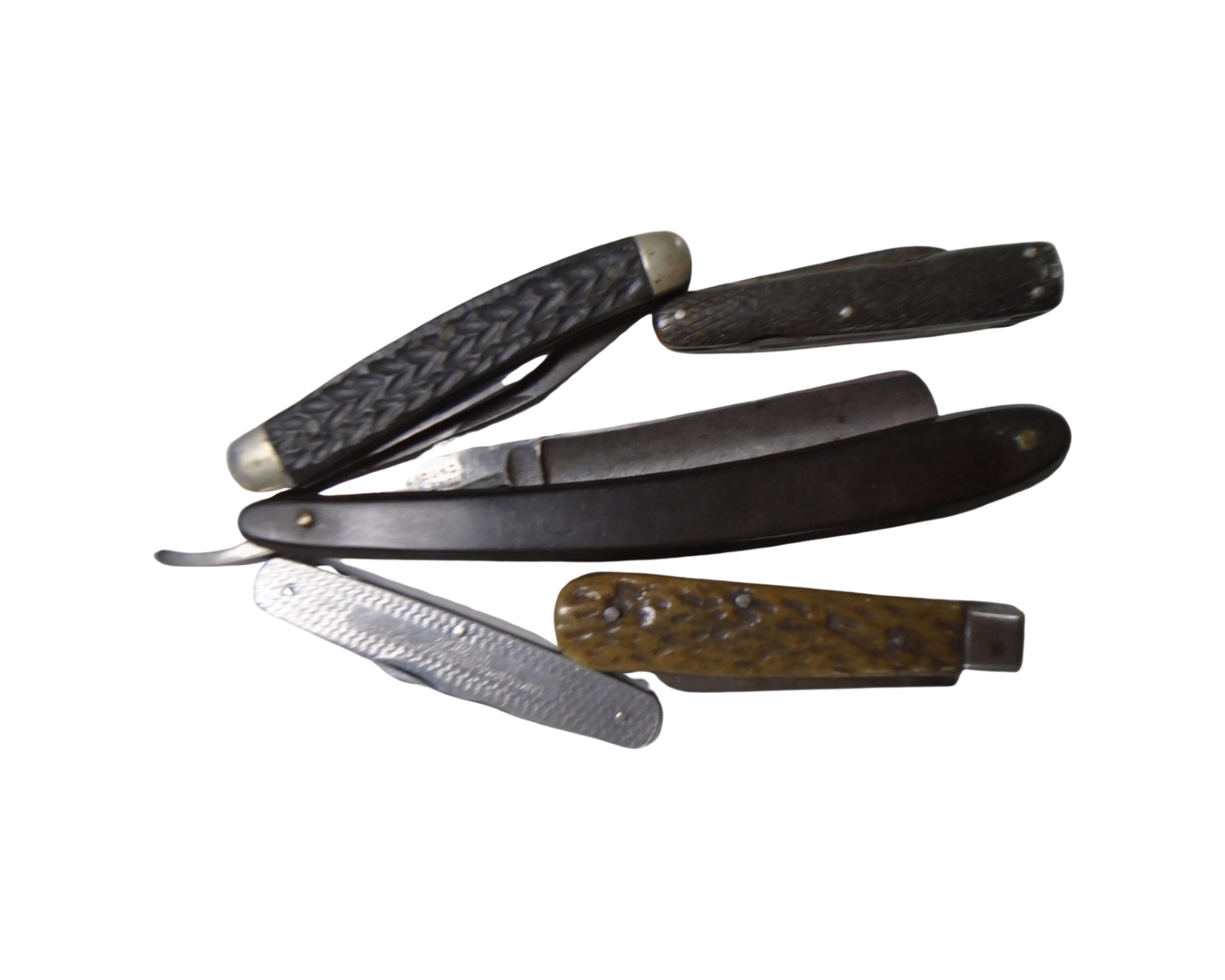 A vintage cut throat razor together with four pen knives.