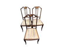 A set of three 19th century inlaid mahogany bedroom chairs.