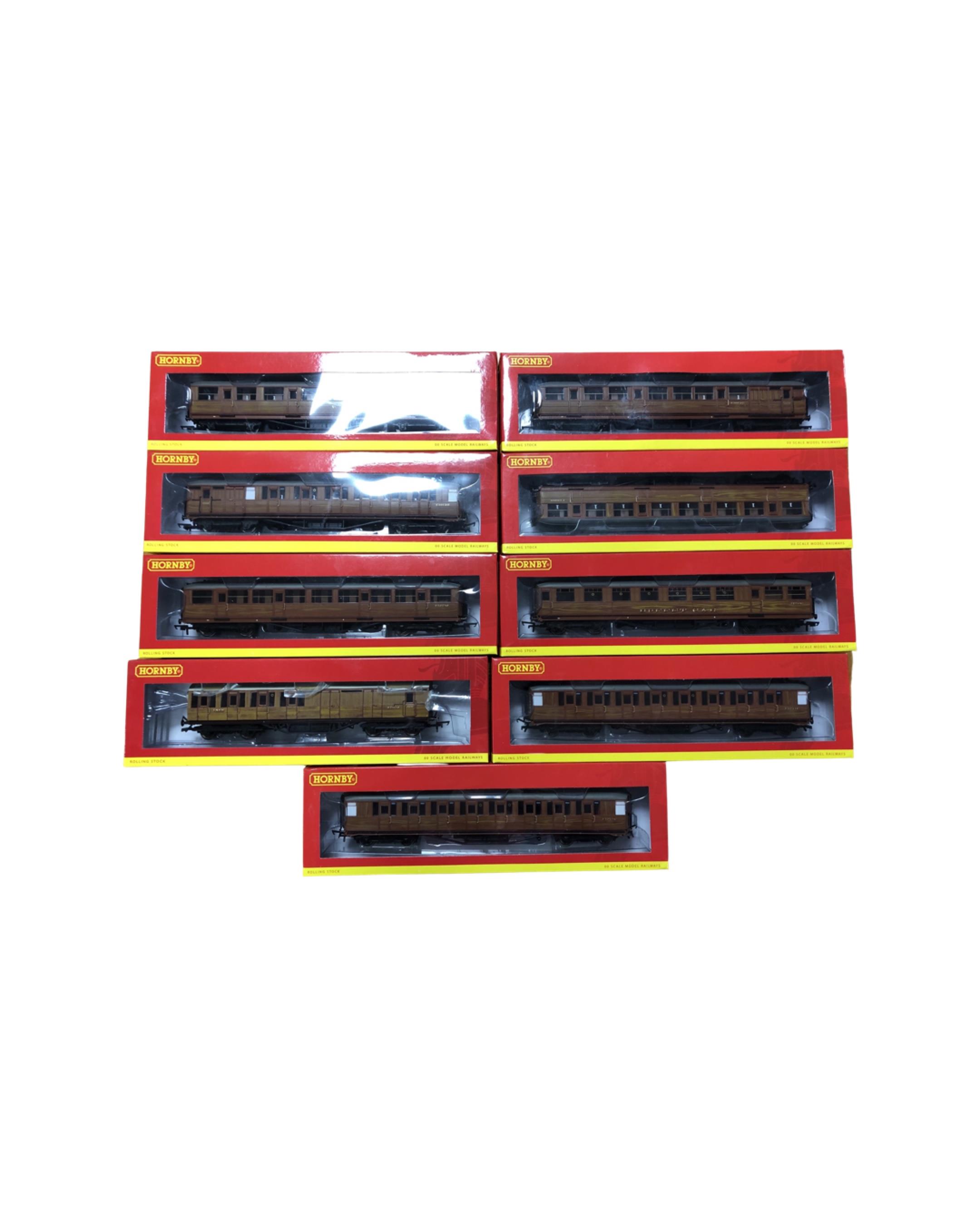 Eight Hornby BR teak 3rd class coaches together with an LNER Thompson suburban brake 3rd class