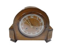 An oak cased 1930's 8-day mantel clock