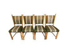 A set of four Scandinavian blond oak dining chairs in green striped fabric