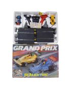 A vintage Scalextric Grand Prix racing set