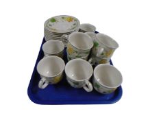 A set of 10 Villeroy and Boch Geranium pattern coffee cups with saucers.