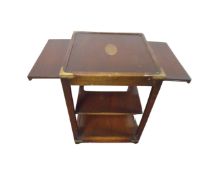 A continental three tier occasional table with brass inlay and slide,