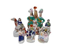 A tray containing six Staffordshire figures.