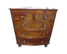 A Victorian mahogany five drawer chest,