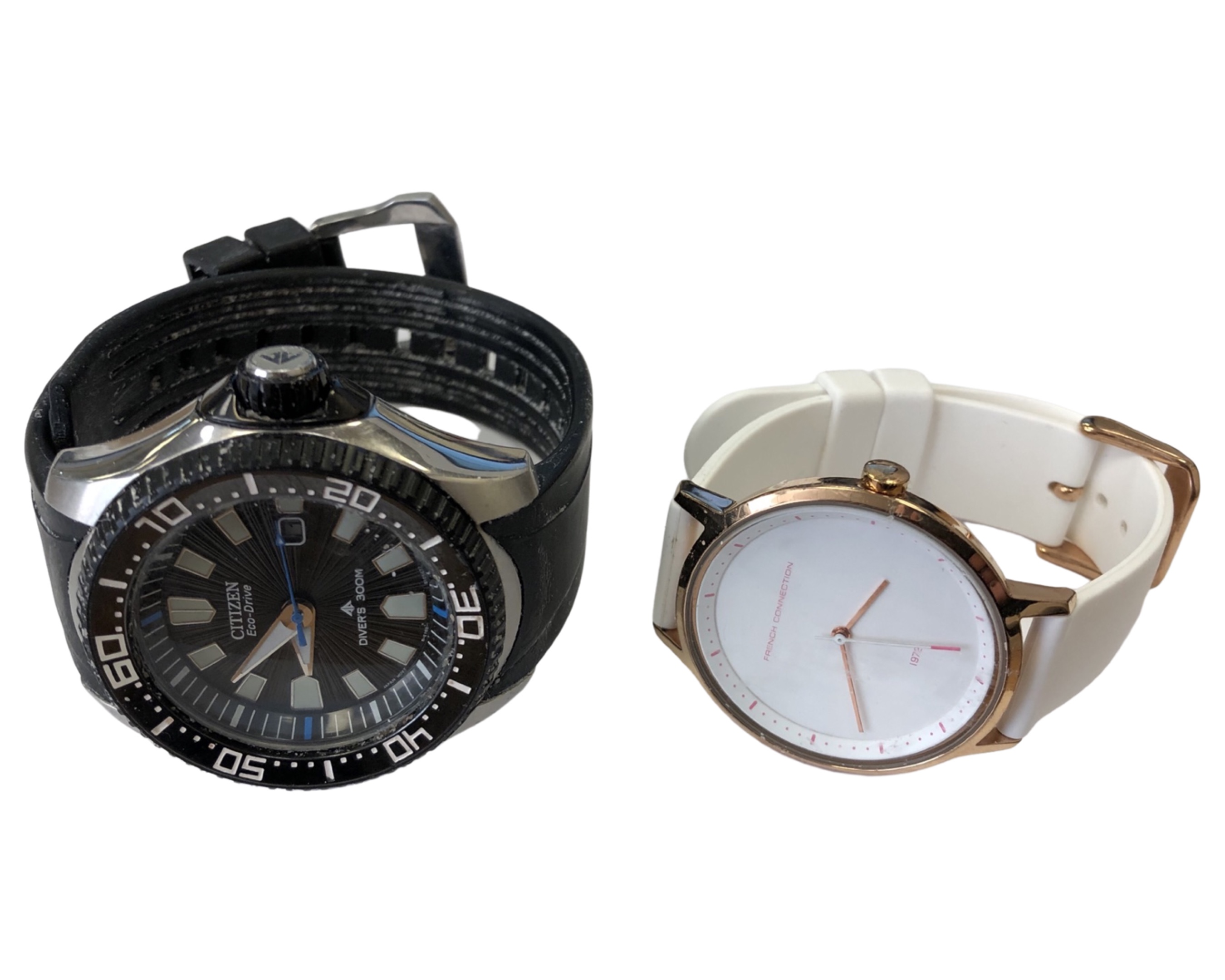 A French Connection wristwatch and a Citizen wristwatch.