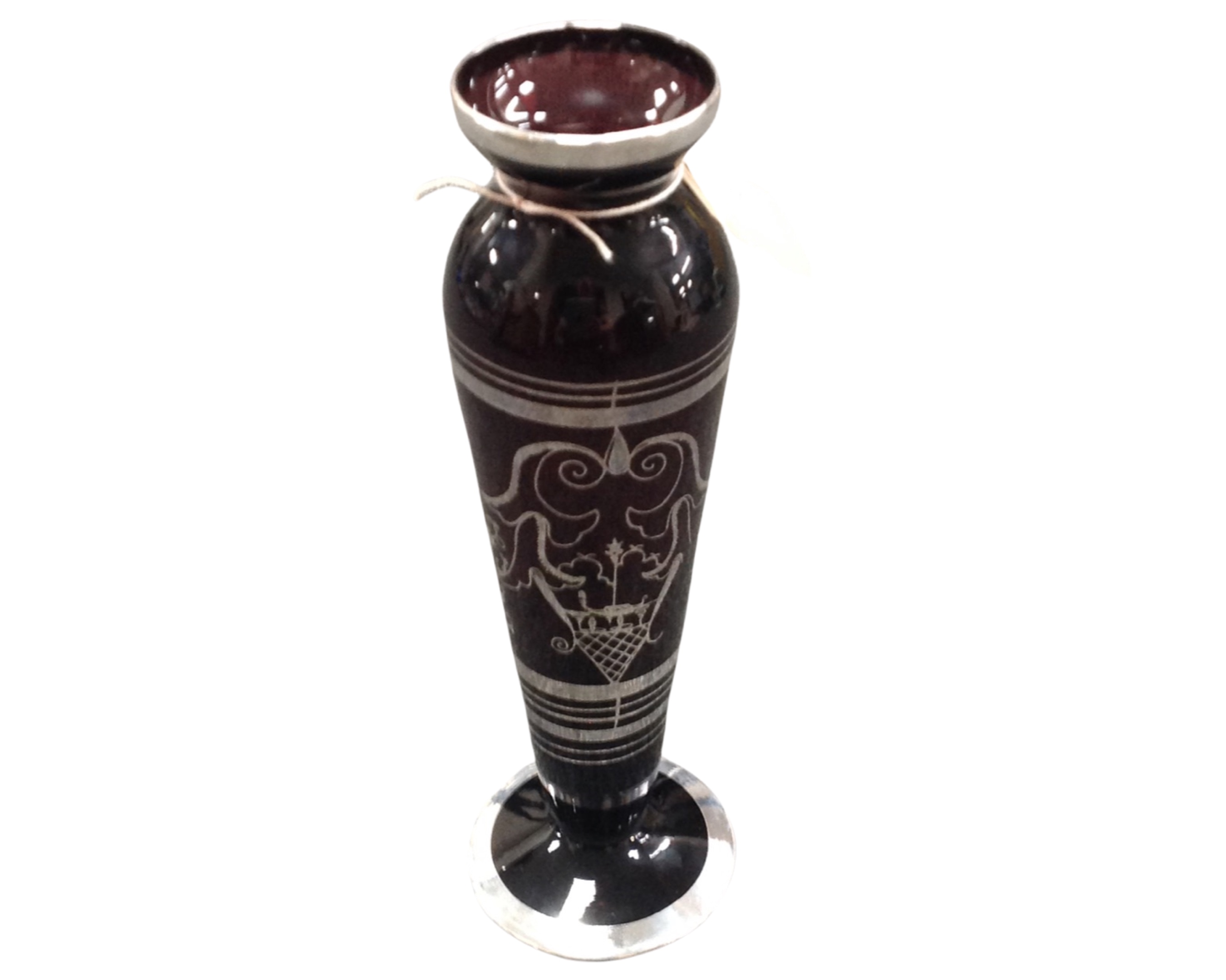 A Twentieth Century ruby glass tapered vase, with decorative silvered overlay, on circular base,