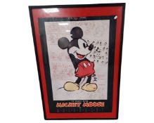 A Mickey Mouse poster in a contemporary frame