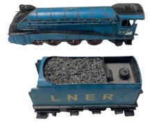 A metal locomotive figure of the LNER Mallard.