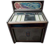 A mid-20th century Rock-ola Princess jukebox together with a small quantity of records