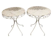 A pair of metal occasional tables
