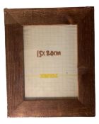 One crate containing fourteen Xenos dark wood 15 cm x 20 cm photo frames,
