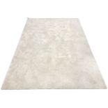 An Ikea Stoense off-white rug, 170 cm x 240 cm.