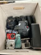 A box containing digital cameras, video cameras, etc.