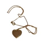 A 9ct yellow gold necklace with 9ct yellow gold heart shaped pendant