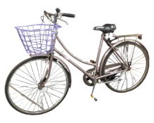 A Raleigh lady's Chilturn bike with basket.