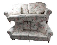 A Delcor three seater and two seater settee in floral fabric