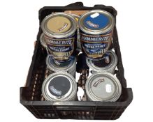 Ten tins of Hammerite metal paint.