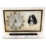 An Art Deco alabaster mantel clock,
