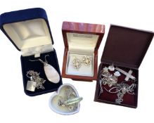 A quantity of silver jewellery including pendants, crucifix,