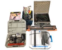 A quantity of tools including tile cutter, sander, drill etc.