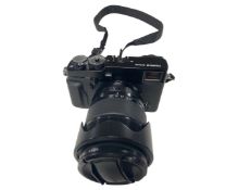 A Fujifilm X-Pro 2 camera with an 18-135mm Super EBC Fujinon Aspherical lens.
