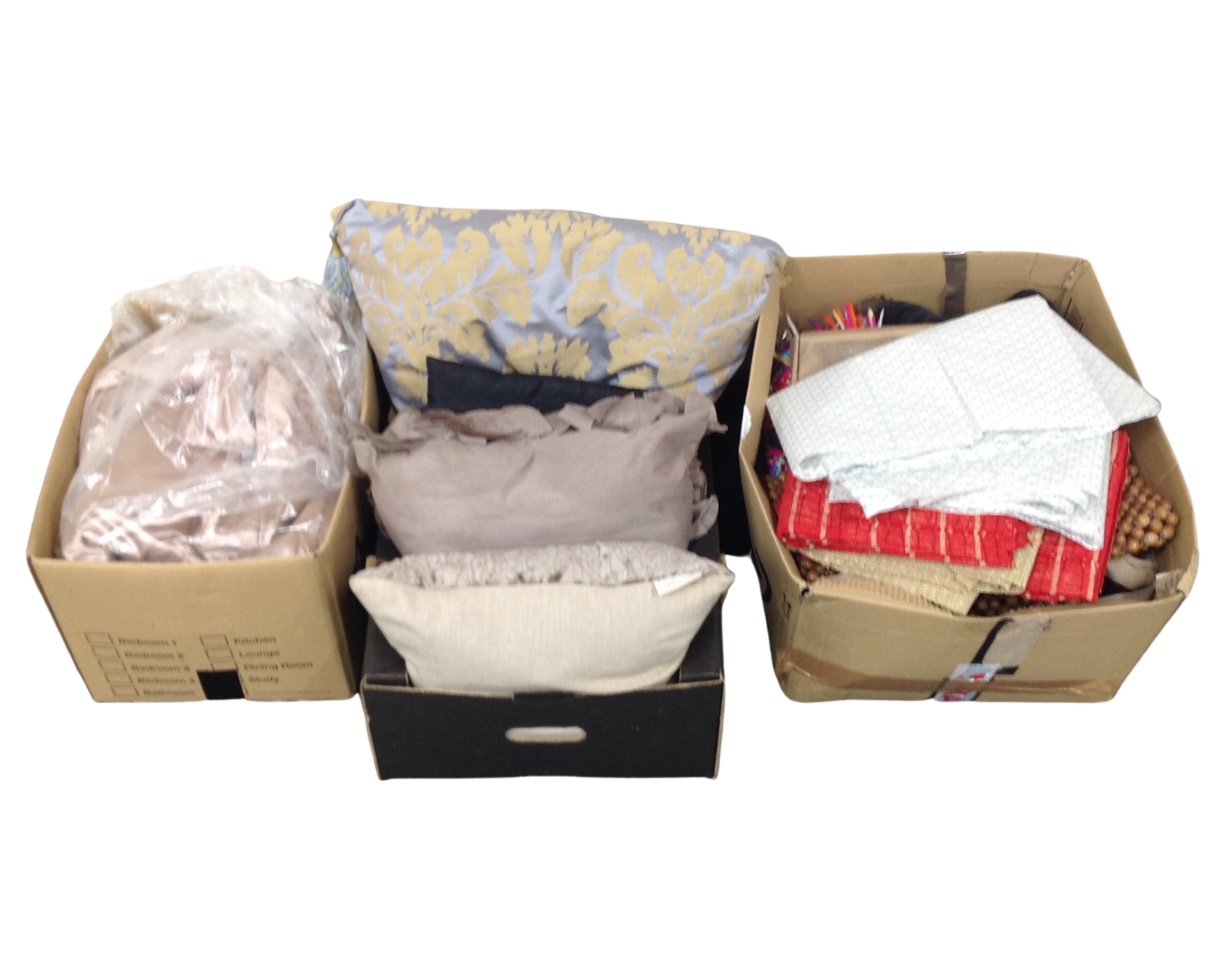 Three boxes containing cushions, linen, a throw etc.
