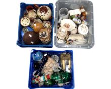 Three boxes containing china ornaments, motto ware and cutlery etc.