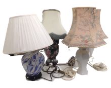 Four pottery table lamps with shade together with two standard lamps.