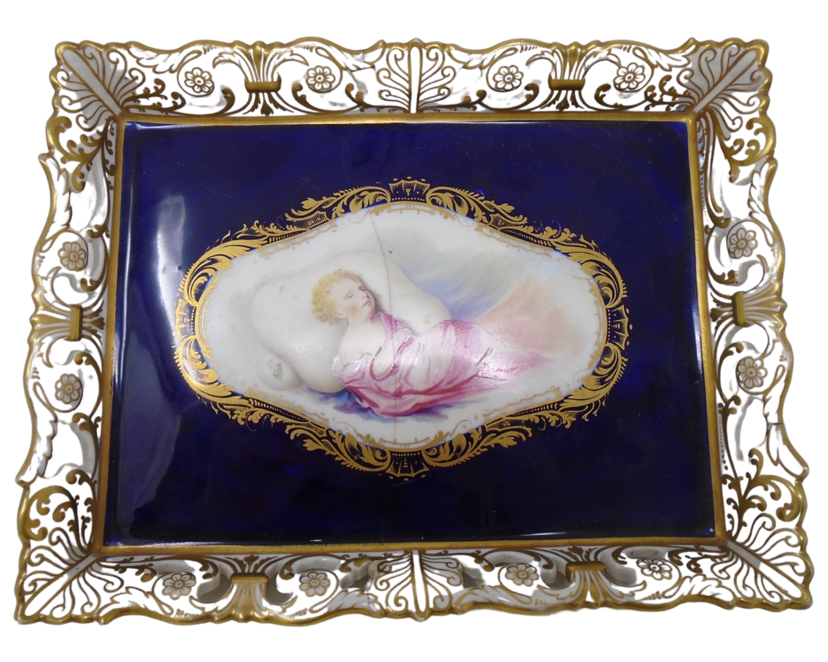 An early 19th century china dish with gallery depicting a sleeping child.