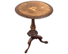 A Victorian carved walnut inlaid occasional table