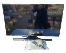 A Samsung 40" LCD TV with remote control.