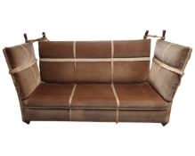 An antique style drop end settee.