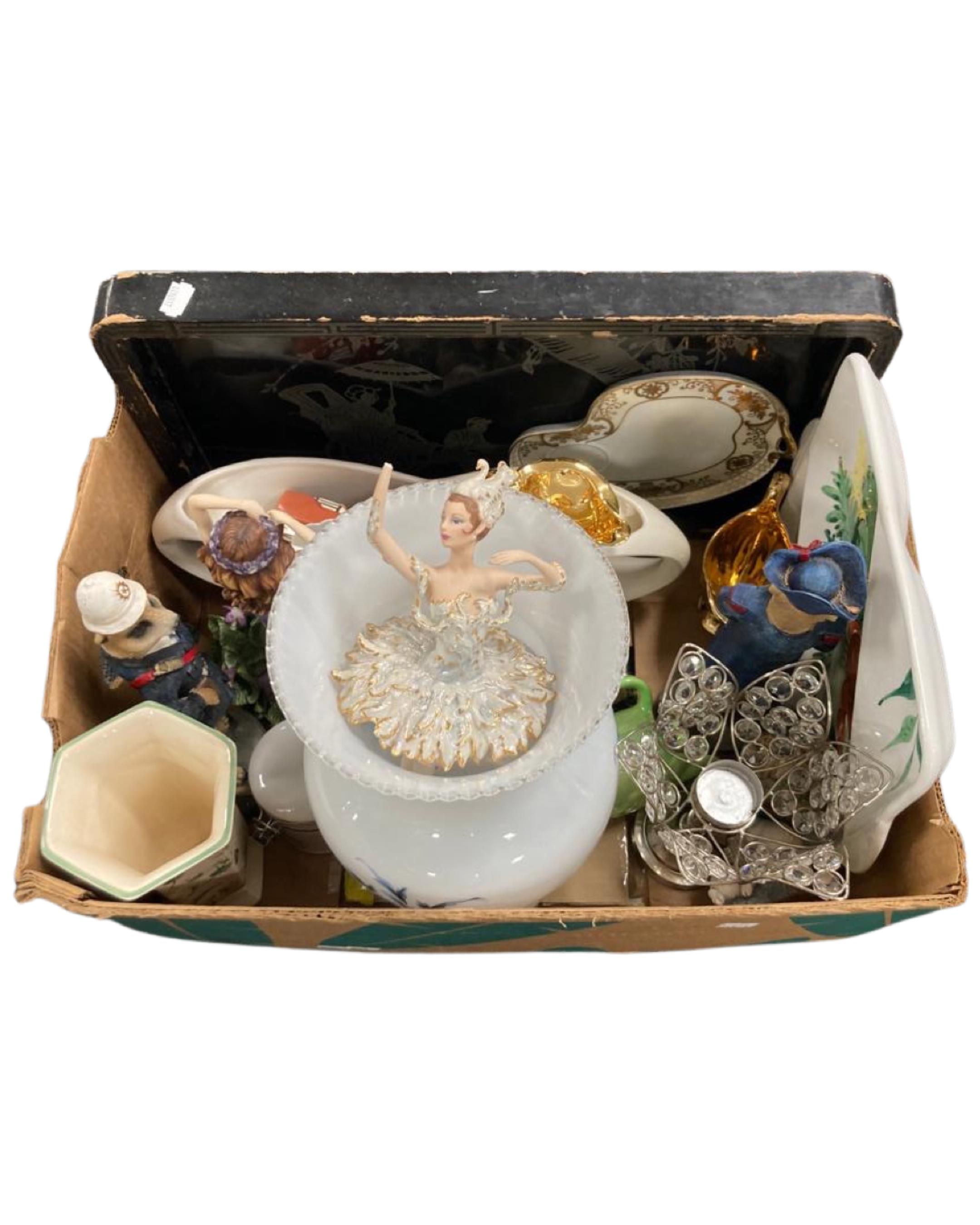 A box of china ornaments together with modern resin figures and a glass vase.