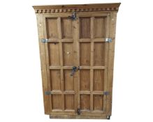 A rustic style pine double door wardrobe