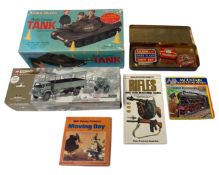 A Corgi Classics military vehicle in box together with a radio controlled tank, a tin,