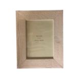 One crate containing thirty six white wood 7" x 5" photo frames,