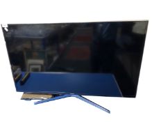 A Samsung 40" LCD TV with remote control.