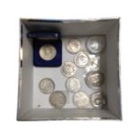 A collection of coins including USA commemorative coins, 1917 silver three pence piece etc.