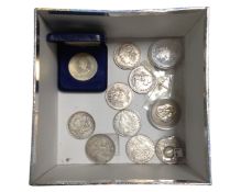 A collection of coins including USA commemorative coins, 1917 silver three pence piece etc.