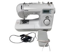 A Brother sewing machine with foot pedal and lead, model Innov IS15.