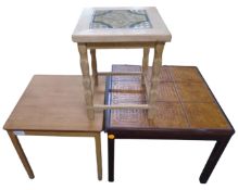 A blonde oak tile topped lamp table together with two further coffee tables.