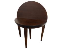 A reproduction mahogany D-shaped turn over top table