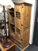 A Mexican pine arch topped double door cocktail cabinet with drawers beneath (Af)