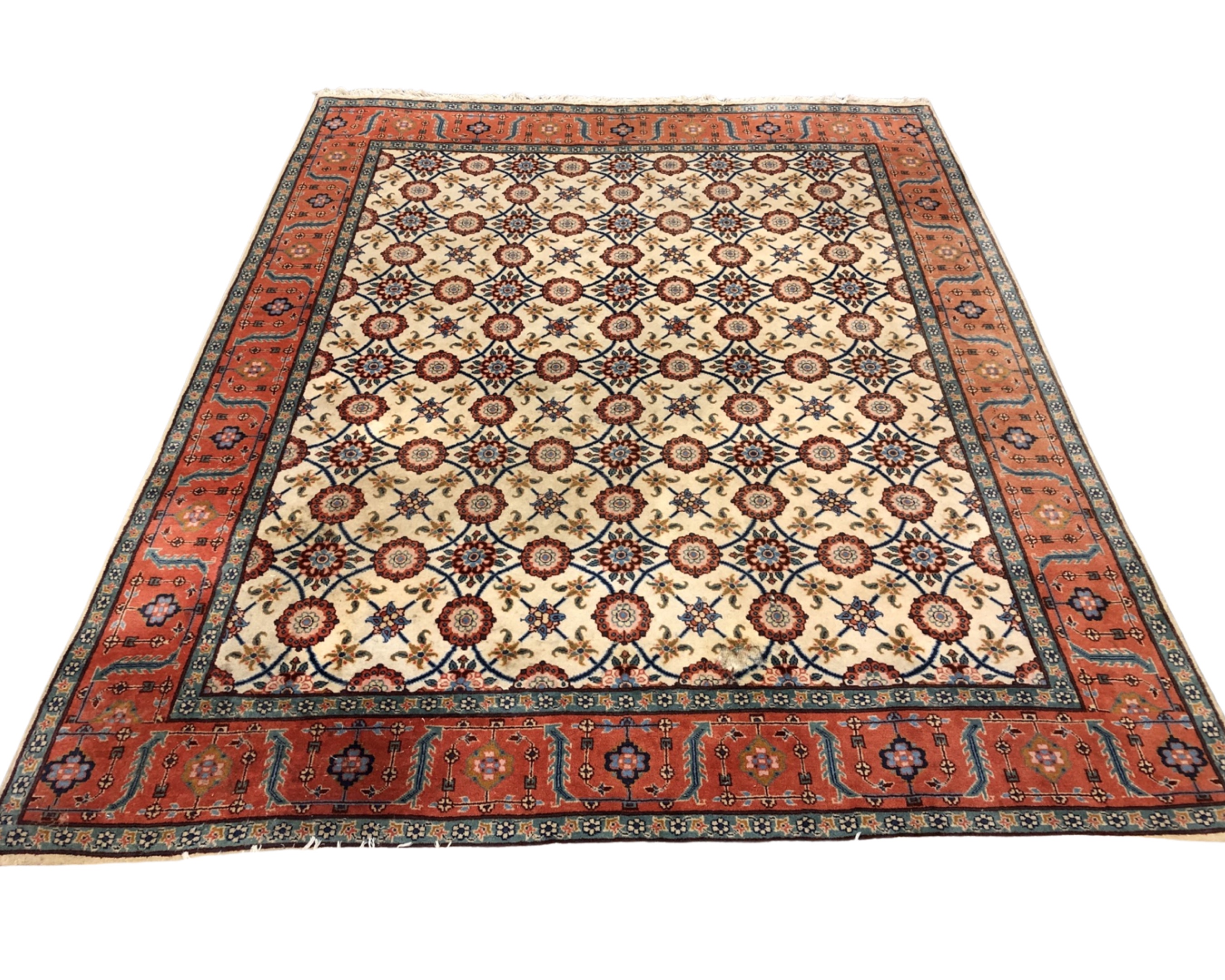 An Indian carpet with repeat lattice motif on cream ground, 201cm by 248cm.