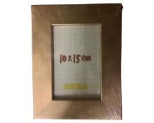 One crate containing nineteen Xenos gilt finish 10 cm x 15 cm photo frames,