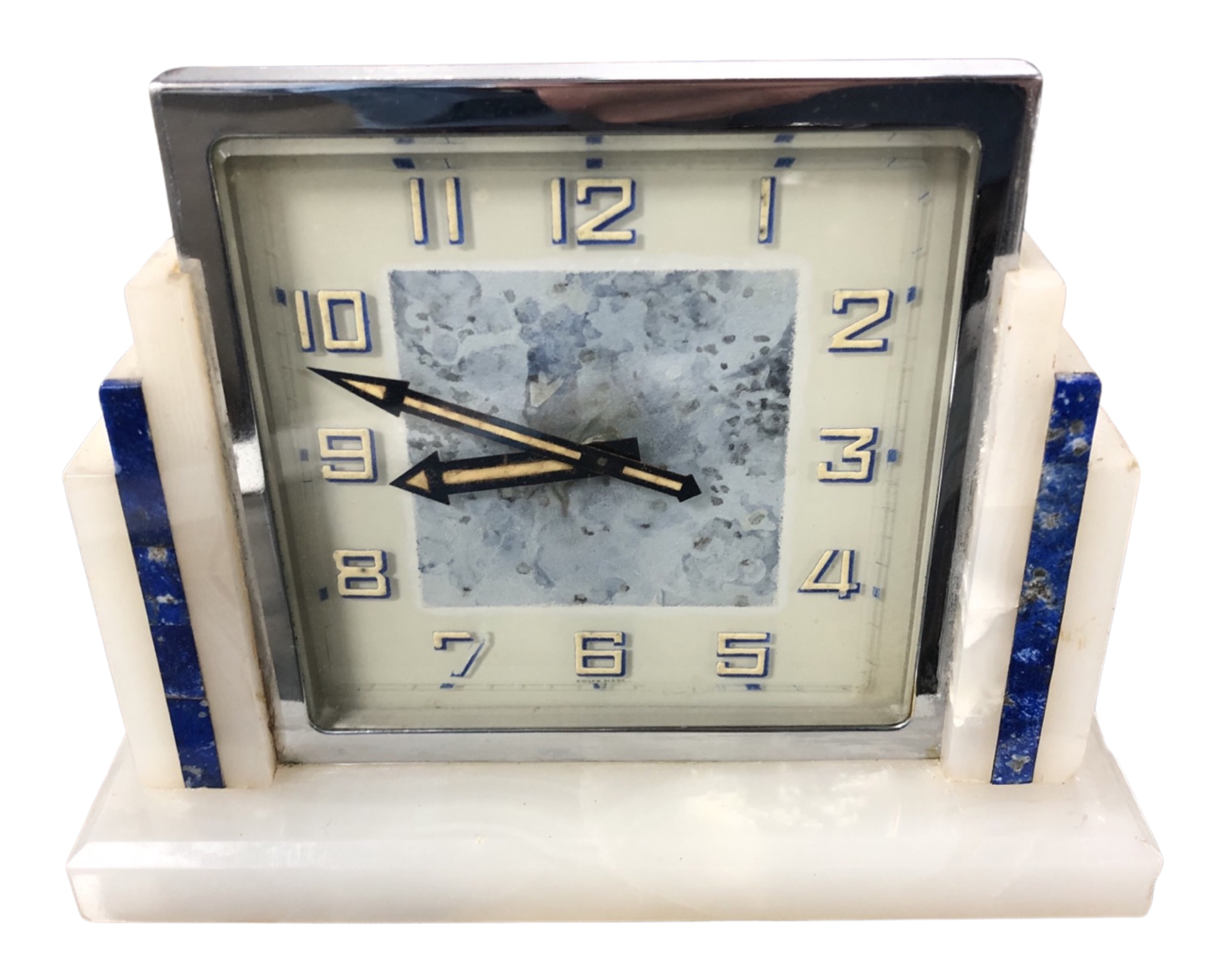 An Art Deco chrome-cased mantel clock, on alabaster and lapis lazuli stand, overall height 12 cm.